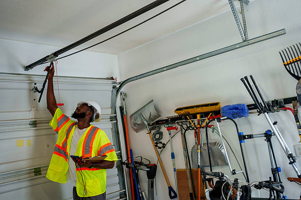 Professional Garage Door Maintenance technician working in Harbor, OR
